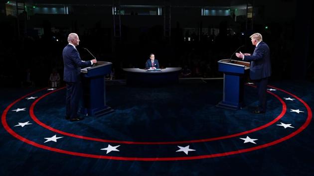 US President Donald Trump and Democratic presidential nominee Joe Biden participate in the first 2020 presidential campaign debate held on the campus of the Cleveland Clinic at Case Western Reserve University in Cleveland, Ohio.(REUTERS)