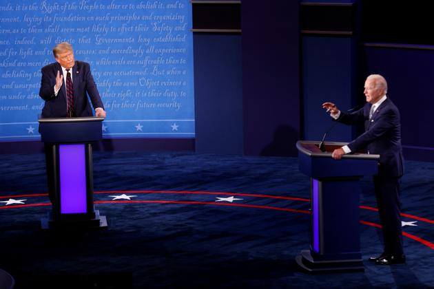 US President Donald Trump and Democratic presidential nominee Joe Biden participate in their first 2020 presidential campaign debate held on the campus of the Cleveland Clinic at Case Western Reserve University in Cleveland, Ohio (REUTERS/Brian Snyder)