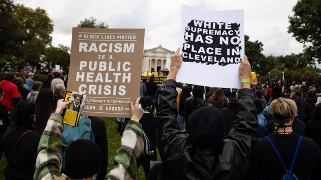 Black Lives Matter supporters gather outside the debate centre at Case Western Reserve University in Cleveland, Ohio on September 29. During the debate Trump was asked if he was willing to condemn white supremacists and tell them to stand down, to which he initially said he would be willing to do anything for peace but then said most of the violence was from the left wing, Reuters reported. (Megan Jelinger / AFP)
