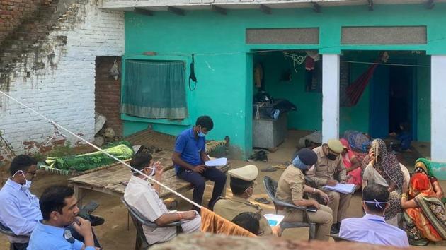 Members of the special investigation team (SIT) recording statements of Hathras gang rape victim’s family members. (HT Photo) Members of the special investigation team (SIT) recording statements of Hathras gang rape victim’s family members. (HT Photo)