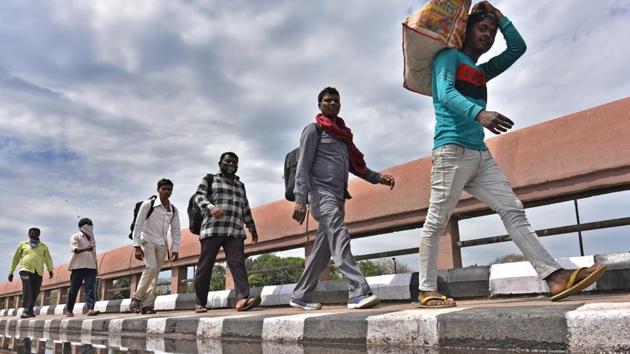 Migrant workers walk back to their villages in Uttar Pradesh earlier in March. (HT file) Migrant workers walk back to their villages in Uttar Pradesh earlier in March. (HT file)