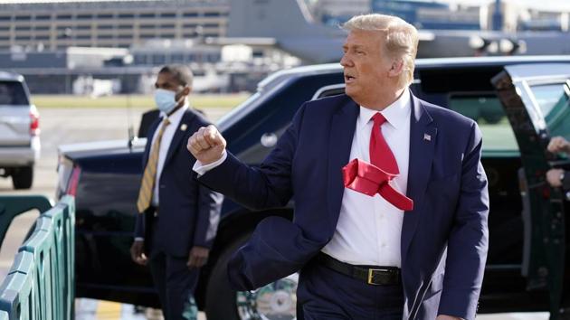President Donald Trump gestures to supporters as he arrives at Minneapolis Saint Paul International Airport, Wednesday, Sept. 30, 2020, in Minneapolis (AP Photo/Alex Brandon) President Donald Trump gestures to supporters as he arrives at Minneapolis Saint Paul International Airport, Wednesday, Sept. 30, 2020, in Minneapolis (AP Photo/Alex Brandon)