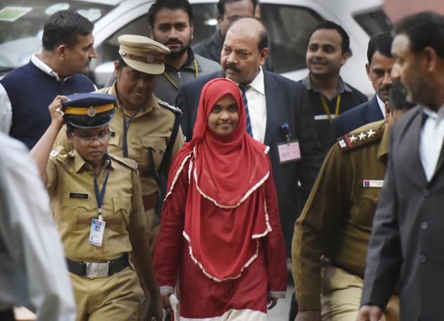 The unique power of the supreme court to shape lives: 24-year-old Hadiya (Akhila) (in red) at the Supreme Court in New Delhi after a hearing on November 27, 2017. (Vipin Kumar/HT PHOTO) The unique power of the supreme court to shape lives: 24-year-old Hadiya (Akhila) (in red) at the Supreme Court in New Delhi after a hearing on November 27, 2017. (Vipin Kumar/HT PHOTO)