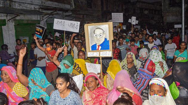 Members of the Valmiki community during a protest over the death of a 19-year-old Dalit woman who was brutally gang-raped two weeks ago in Hathras (UP), in Mathura.(PTI)