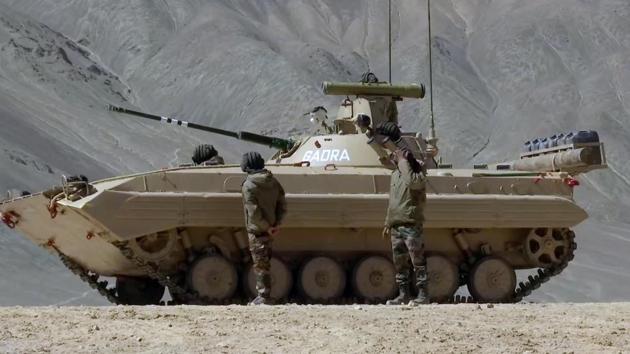 Soldiers of the Indian Army operating T-90 Bhishma tank near the Line of Actual Control in the Chumar-Demchok area of Eastern Ladakh on Sunday.(ANI) Soldiers of the Indian Army operating T-90 Bhishma tank near the Line of Actual Control in the Chumar-Demchok area of Eastern Ladakh on Sunday.(ANI)