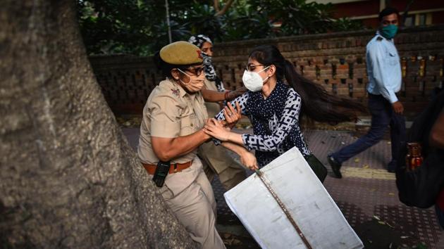 Police officials detain students from various organizations protesting against the Hathras incident at Delhi University’s Arts Faculty in New Delhi on October 1. “India is a casteist society and most of the authority and state machinery support the dominant castes for political benefits. The policemen are also not free of caste bias,” Kiruba Munusamy, a New Delhi-based researcher and Supreme Court lawyer told Bloomberg. (Sanchit Khanna/HT Photo) Police officials detain students from various organizations protesting against the Hathras incident at Delhi University’s Arts Faculty in New Delhi on October 1. “India is a casteist society and most of the authority and state machinery support the dominant castes for political benefits. The policemen are also not free of caste bias,” Kiruba Munusamy, a New Delhi-based researcher and Supreme Court lawyer told Bloomberg. (Sanchit Khanna/HT Photo)