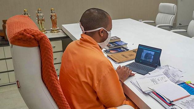 Uttar Pradesh Chief Minister Yogi Adityanath interacts with father of the Hathras victim through a video call in Lucknow on September 30. Adityanath also tweeted that a speedy trial would be conducted to punish the guilty. However, many political leaders have come out issuing strong statements against the government’s inefficient handling of the case. (PTI) Uttar Pradesh Chief Minister Yogi Adityanath interacts with father of the Hathras victim through a video call in Lucknow on September 30. Adityanath also tweeted that a speedy trial would be conducted to punish the guilty. However, many political leaders have come out issuing strong statements against the government’s inefficient handling of the case. (PTI)