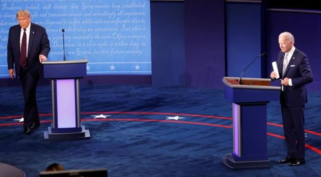 US President Donald Trump and Democratic presidential nominee Joe Biden are seen on stage after the first 2020 presidential campaign debate held on the campus of the Cleveland Clinic at Case Western Reserve University in Cleveland, Ohio, US, September 29, 2020. REUTERS/Brian Snyder US President Donald Trump and Democratic presidential nominee Joe Biden are seen on stage after the first 2020 presidential campaign debate held on the campus of the Cleveland Clinic at Case Western Reserve University in Cleveland, Ohio, US, September 29, 2020. REUTERS/Brian Snyder