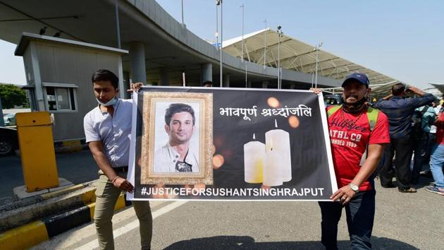 Sushant Singh Rajput's aides stage a demonstration demanding justice for the late actor, outside the airport in New Delhi.(PTI)