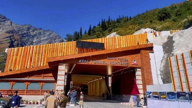 Security personnel stand guard outside Atal tunnel on Manali-Leh national highway.(PTI)
