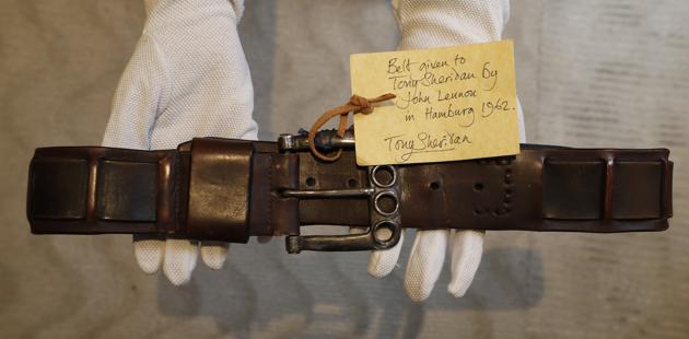 A belt that belonged to John Lennon and was given to Tony Sheridan in Hamburg in 1962 is displayed at Sotheby's auction rooms in London, Friday, Sept. 25, 2020. The belt is estimated at 4,000-6,000 UK pounds (4977-7465 US dollars). (AP)