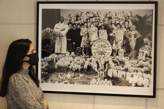 A Sgt Pepper's Lonely Hearts Club Band, 1967, silver print 1/25 is displayed at Sotheby's auction rooms in London, Friday, Sept. 25, 2020. The photograph is estimated at 7,000-10,000 UK pounds (8,709- 12,442 US dollars). (AP)