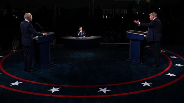 US President Donald Trump and Democratic presidential nominee Joe Biden during the first US 2020 presidential debate at Case Western Reserve University and the Cleveland Clinic in Cleveland, Ohio on September 29. White House aide Hope Hicks was part of a large entourage that travelled to Ohio with Trump aboard Air Force One for the debate, including members of the Trump family. Trump’s adult children and senior staff did not wear masks during the debate, violating host rules, AP reported. (Olivier Douliery / AFP / Bloomberg)