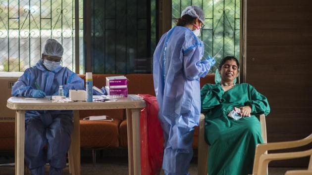 Health care staff test doctors for Covid-19 at Matunga in Mumbai on October 02. India’s case fatality rate (CFR) or the proportion of death to the number of confirmed cases continues to be far lower than the global average of 2.98% and stands at 1.56%. This is better than comparable CFR rates in the US at 2.84% and Brazil at 2.99%. (Pratik Chorge / HT Photo)