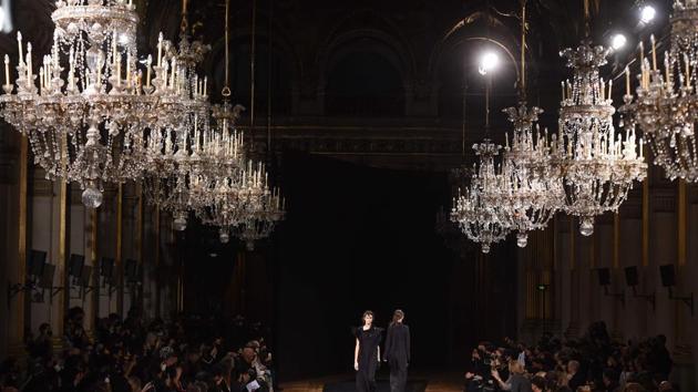 A model presents a creation by Yohji Yamamoto during the Womenswear Spring Summer 2021 as part of the Fashion Week in Paris on October 02, 2020.(AFP)