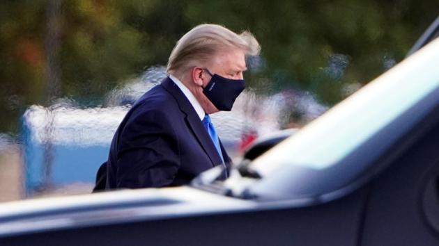 US President Donald Trump arrives at Walter Reed National Military Medical Center by helicopter after testing positive for the coronavirus disease, in Bethesda, Maryland. (REUTERS) US President Donald Trump arrives at Walter Reed National Military Medical Center by helicopter after testing positive for the coronavirus disease, in Bethesda, Maryland. (REUTERS)