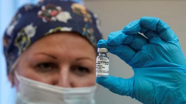 A nurse shows Russia's "Sputnik-V" vaccine against the coronavirus disease (Covid-19) prepared for inoculation in a post-registration trials stage at a clinic in Moscow, Russia.(Reuters File Photo) A nurse shows Russia's "Sputnik-V" vaccine against the coronavirus disease (Covid-19) prepared for inoculation in a post-registration trials stage at a clinic in Moscow, Russia.(Reuters File Photo)