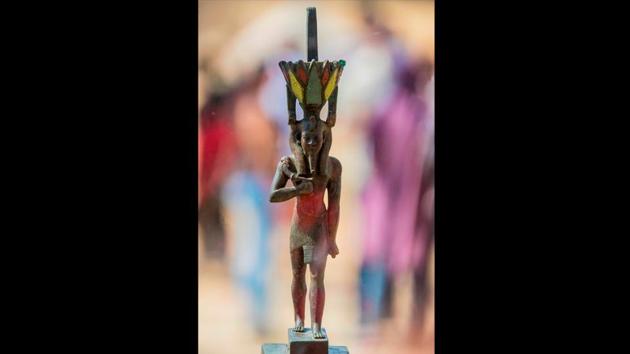 Waziri said archaeologists also found a total of 28 statuettes of Ptah-Soker the main god of the Saqqara necropolis, and this beautifully carved 35 cm tall bronze statuette of god Nefertem, inlaid with precious stones. The name of its owner, Priest Badi-Amun, is written on its base, he said. (Khaled Desouki / AFP)
