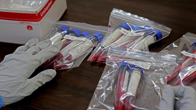 A health officer working at one of the Covid 19 testing centre in Pune.(Ravindra Joshi/HT File Photo)