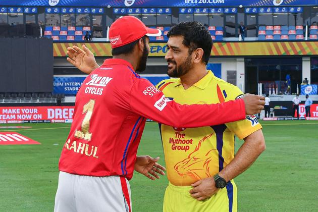Chennai Super Kings skipper MS Dhoni and Kings XI Punjab skipper KL Rahul after the toss during IPL 2020 cricket match, Dubai Cricket Stadium in Dubai, United Arab Emirates, Sunday, Oct. 4, 2020. (PTI Photo/Sportzpics for BCCI)(PTI04-10-2020_000201A) (PTI)