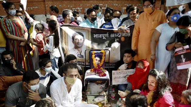 Bollywood actor late Sushant Singh Rajput's supporters stage a protest demanding justice for him at Jantar Mantar in New Delhi.(PTI)