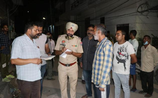 A police official conducting investigation at Thapar Colony after a youth was shot at in Ludhiana on Monday. (HT Photo) A police official conducting investigation at Thapar Colony after a youth was shot at in Ludhiana on Monday. (HT Photo)