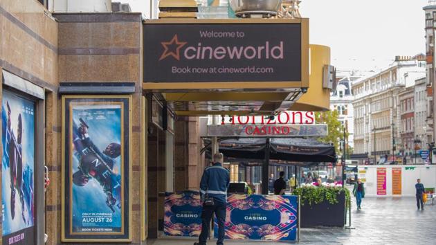 A sign sits above a Cineworld Group Plc cinema in Leicester Square in London, U.K, on Monday.(Bloomberg) A sign sits above a Cineworld Group Plc cinema in Leicester Square in London, U.K, on Monday.(Bloomberg)