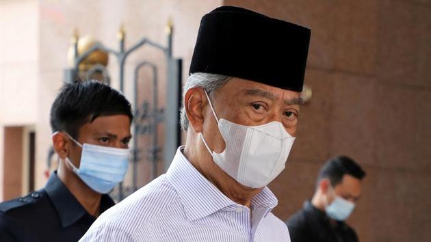 Malaysia PM quarantines as minister tests positive for ...