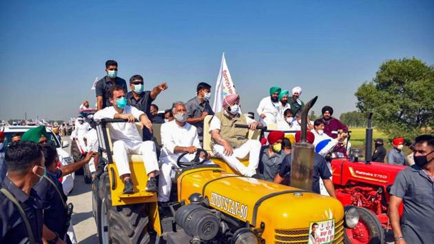 On the first day of the tractor rally, Gandhi was joined by chief minister Amarinder Singh and several senior party leaders including Navjot Singh Sidhu. (PTI Photo) On the first day of the tractor rally, Gandhi was joined by chief minister Amarinder Singh and several senior party leaders including Navjot Singh Sidhu. (PTI Photo)