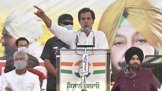 Congress leader Rahul Gandhi addresses the gathering with PPCC president Sunil Jakhar (L) and Navjot Singh Sidhu (R) present on stage during a public rally at Raikot village near Ludhiana, Punjab, India on Sunday, October 04, 2020. (Photo: Gurpreet Sinngh/Hindustan Times) Congress leader Rahul Gandhi addresses the gathering with PPCC president Sunil Jakhar (L) and Navjot Singh Sidhu (R) present on stage during a public rally at Raikot village near Ludhiana, Punjab, India on Sunday, October 04, 2020. (Photo: Gurpreet Sinngh/Hindustan Times)