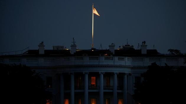 A view of the White House while US President Donald Trump is undergoing treatment for coronavirus disease at Walter Reed National Military Medical Center, in Washington on October 5. “They (presidential staff) might get sick. They may die. For political theater. Commanded by Trump to put their lives at risk for theater. This is insanity,” Phillips added as reported by AFP. (Carlos Barria / REUTERS)