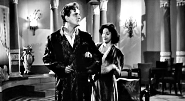 Prithviraj Kapoor, his plush-looking dressing gown, and Nargis, in a scene from Awara (1951).