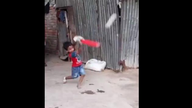 The image shows the boy hitting a shot. (Twitter/@cricketaakash) The image shows the boy hitting a shot. (Twitter/@cricketaakash)