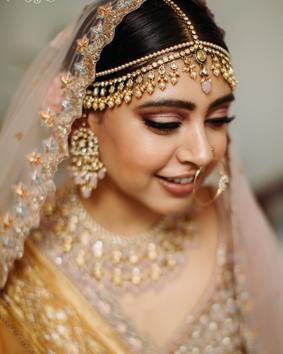 Niti looked stunning in a pale pink lehenga by Payal Keyal and matching jewellery by Purab Paschim. (Instagram)