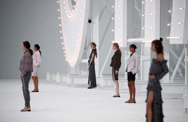 The set pays homage to Chanel’s time of glory in Tinseltown in the 1930s. The models walked to the backdrop of a Hollywood style sign that read Chanel. (REUTERS)