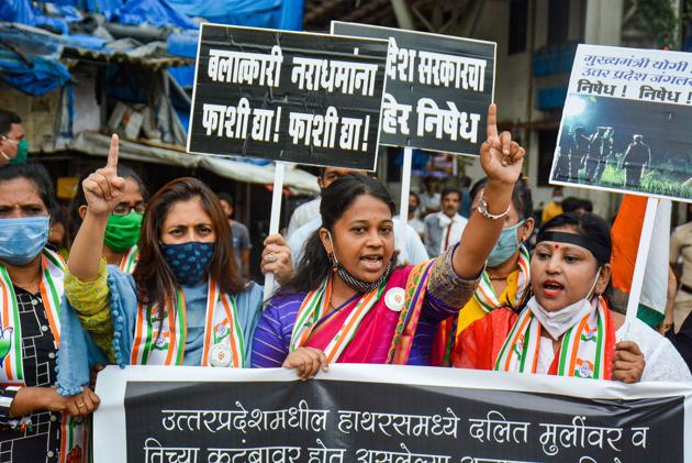 Congress party workers protesting against the death of a 19-year-old Dalit girl who was allegedly gang-raped in Hathras (UP). She later succumbed to her injuries.(PTI PHOTO.) Congress party workers protesting against the death of a 19-year-old Dalit girl who was allegedly gang-raped in Hathras (UP). She later succumbed to her injuries.(PTI PHOTO.)