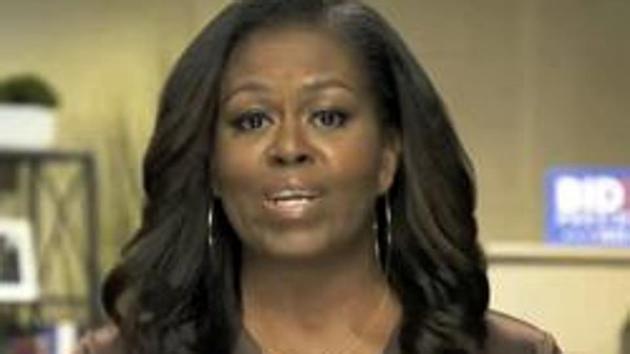 In the video, released Tuesday by Joe Biden’s campaign, Mrs. Obama notes that more Americans have died from Covid-19 than died in the Iraq, Afghanistan, Vietnam and Korean wars combined.(AP)