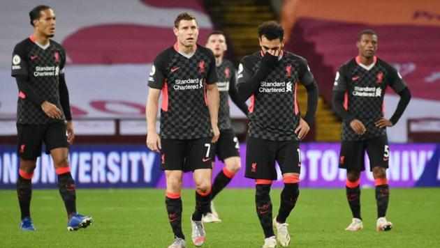 Liverpool's Mohamed Salah, James Milner and teammates look dejected after conceding their seventh goal. (Pool via REUTERS) Liverpool's Mohamed Salah, James Milner and teammates look dejected after conceding their seventh goal. (Pool via REUTERS)