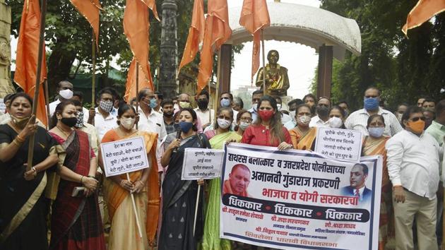 Shiv Sena supporters hold a protest demanding justice for the 19-year-old Dalit woman who died after being allegedly gang-raped and assaulted in Hathras, outside Shivaji Park in Mumbai on October 3. (PTI) Shiv Sena supporters hold a protest demanding justice for the 19-year-old Dalit woman who died after being allegedly gang-raped and assaulted in Hathras, outside Shivaji Park in Mumbai on October 3. (PTI)