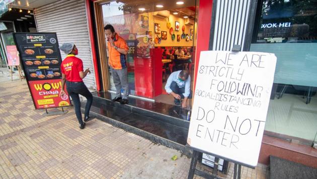 A restaurant in service under social distancing norms at Chembur in Mumbai on October 5. “There is happiness among the patrons who came to dine on the first day. We are taking all precautions to ensure their safety and also requesting them for prior reservation so that we can plan better,” Amrish Arora, Managing Director of Fountain Hospitality Private Limited that runs four restaurants in Mumbai told HT. (Pratik Chorge / HT Photo)