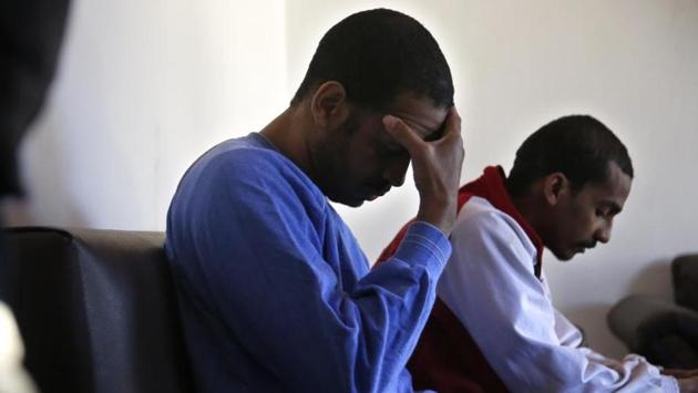In this March 30, 2018 file photo, Alexanda Amon Kotey, left, and El Shafee Elsheikh, who were allegedly among four British jihadis who made up a brutal Islamic State cell dubbed “The Beatles,” sit on a sofa during an interview with The Associated Press at a security center in Kobani, Syria. (AP Photo) In this March 30, 2018 file photo, Alexanda Amon Kotey, left, and El Shafee Elsheikh, who were allegedly among four British jihadis who made up a brutal Islamic State cell dubbed “The Beatles,” sit on a sofa during an interview with The Associated Press at a security center in Kobani, Syria. (AP Photo)