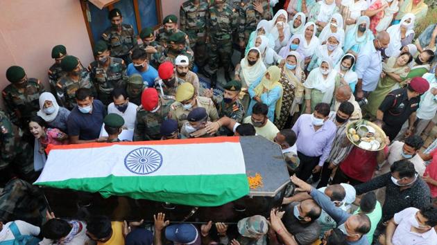 Last rites of army JCO Sukhdev Singh were carried out after his mortal remains arrived, at Peoni village in Udhampur district. (PTI Photo) Last rites of army JCO Sukhdev Singh were carried out after his mortal remains arrived, at Peoni village in Udhampur district. (PTI Photo)