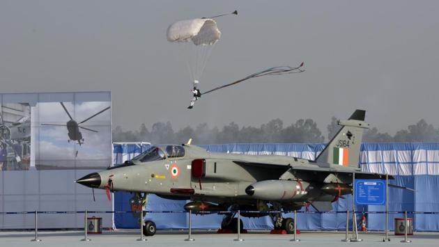 An IAF paratrooper lands during the 88th Indian Air Force Day celebrations at Hindon Airbase in Ghaziabad on October 8. Prime Minister Narendra Modi congratulated the IAF on the special occasion. “You not only keep the skies of the country safe, but also play a leading role in the service of humanity in times of disaster. Your courage, valour and dedication to protect Mother India is inspiring everyone,” he tweeted. (Sanjeev Verma / HT Photo)