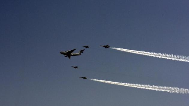 A C-17 Globemaster and fighter aircraft in formation at Hindon Airbase on October 8. On the ongoing standoff with China in Ladakh, Bhadauria said, “I commend all air warriors for a quick response in the recent standoff on the northern frontiers, when we deployed our combat assets at short notice to handle any eventuality and provided proactive support to all requirements of deployment and sustenance for Indian Army.” (Sanjeev Verma / HT Photo)