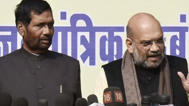 Home minister Amit Shah with union minister Ram Vilas Paswan in New Delhi. (Vipin Kumar / Hindustan Times Photo Archives) Home minister Amit Shah with union minister Ram Vilas Paswan in New Delhi. (Vipin Kumar / Hindustan Times Photo Archives)