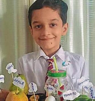 A student of Shivalik Public School in Mohali, with a tray full of his favourite healthy food items.(HT) A student of Shivalik Public School in Mohali, with a tray full of his favourite healthy food items.(HT)
