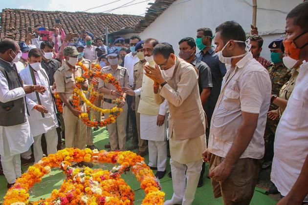 Madhya Pradesh CM Shivraj Singh Chouhan pays tribute to the mortal remains of CRPF jawan Dhirendra Tripathi. (PTI Photo) Madhya Pradesh CM Shivraj Singh Chouhan pays tribute to the mortal remains of CRPF jawan Dhirendra Tripathi. (PTI Photo)