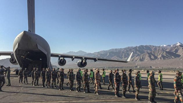 An IAF transport aircraft brings in essentials supplies at a base in Ladakh amid tensions with China along the Line of Actual Control. (PTI) An IAF transport aircraft brings in essentials supplies at a base in Ladakh amid tensions with China along the Line of Actual Control. (PTI)
