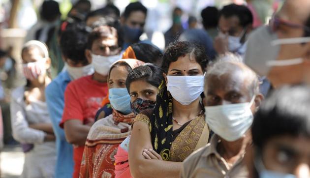 People queue to register for coronavirus tests, at Sector 30 District Hospital, in Noida (Photo by Sunil Ghosh / Hindustan Times) People queue to register for coronavirus tests, at Sector 30 District Hospital, in Noida (Photo by Sunil Ghosh / Hindustan Times)
