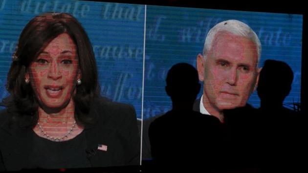 People watch the debate between US vice president Mike Pence and Democratic vice-presidential nominee Kamala Harris outside a tavern in San Diego, California (REUTERS/ Mike Blake) People watch the debate between US vice president Mike Pence and Democratic vice-presidential nominee Kamala Harris outside a tavern in San Diego, California (REUTERS/ Mike Blake)